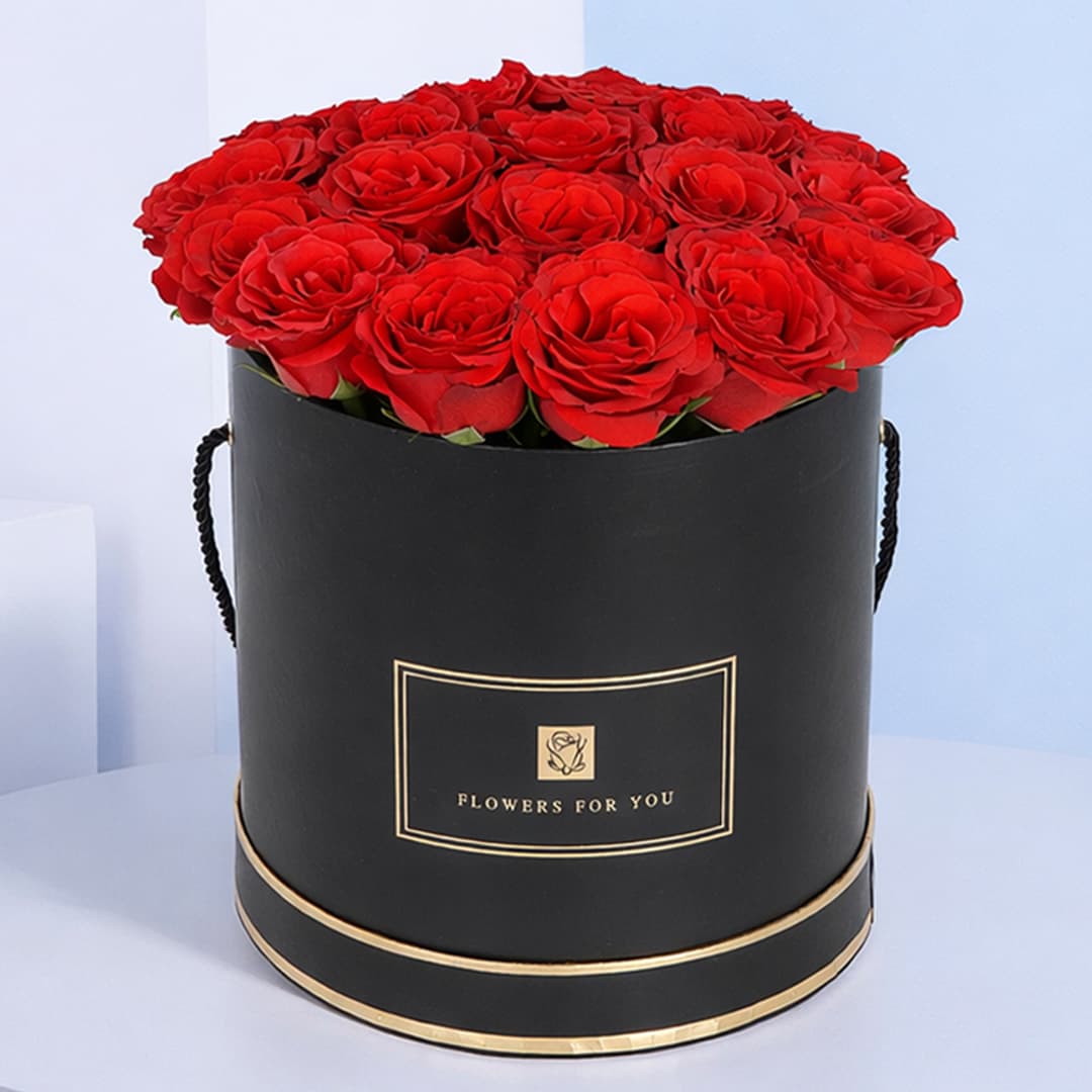20 stunning red rose stems elegantly presented in an easy-to-carry black box.