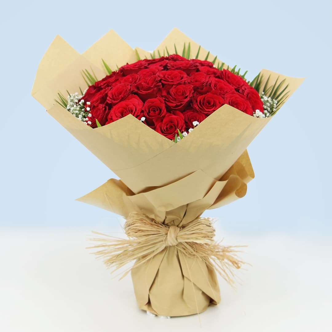 Hand Bouquet of Graceful Red Roses