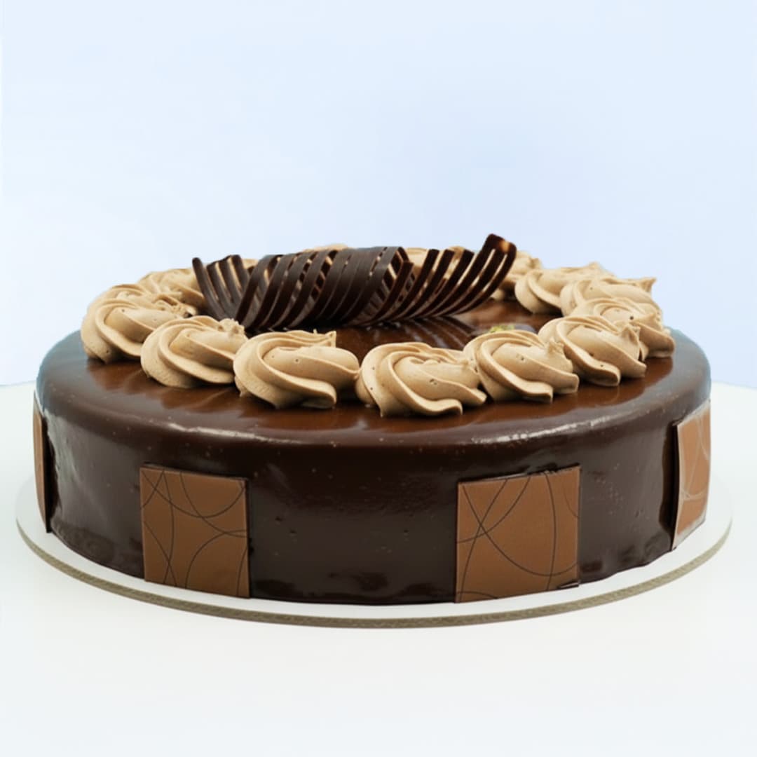 Chocolate Crunch Cake 1 Kg by Mister Baker with creamy swirls and chocolate garnish.