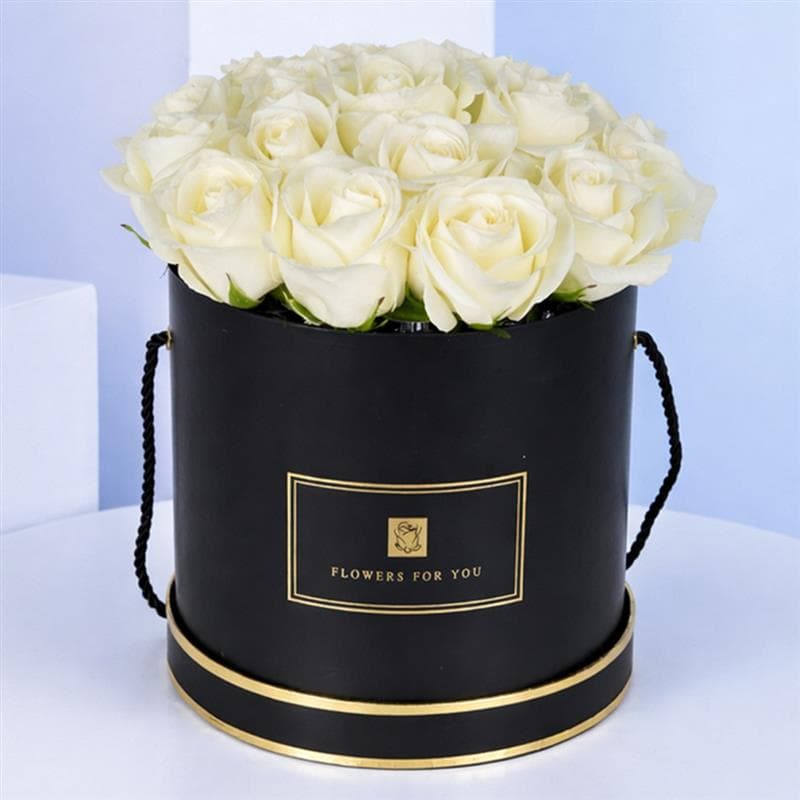 Beautifully arranged 20-stem white roses in a convenient, easy-to-carry black box.
