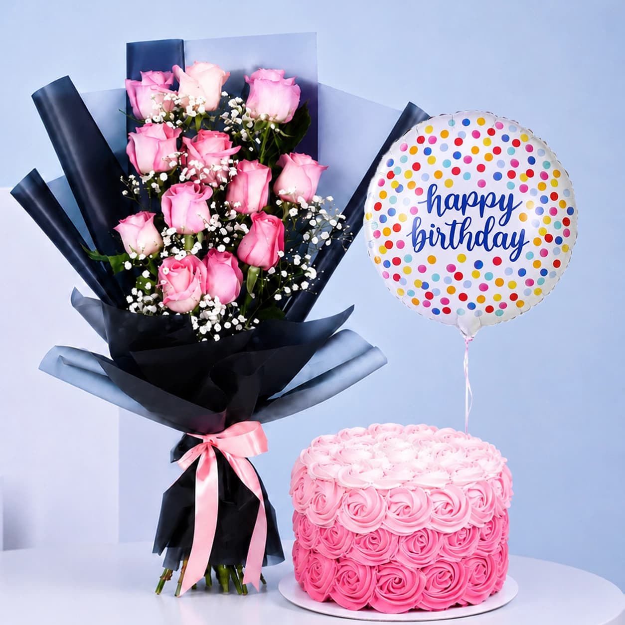 A vibrant birthday bouquet featuring 12 pink roses alongside a decorated cake, celebrating a special occasion.
